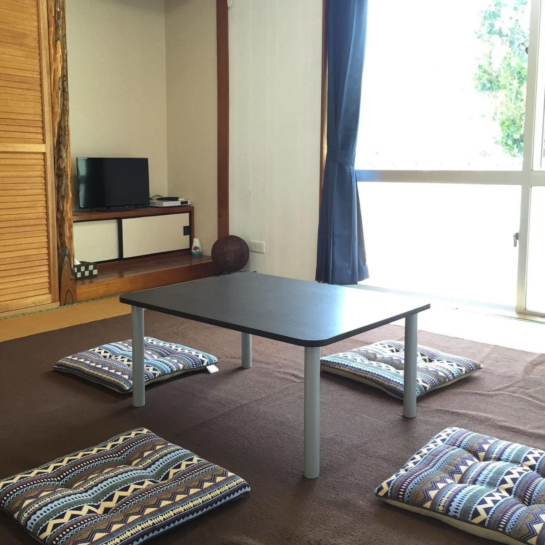 Guesthouse Seagull Village Motobu Exterior foto